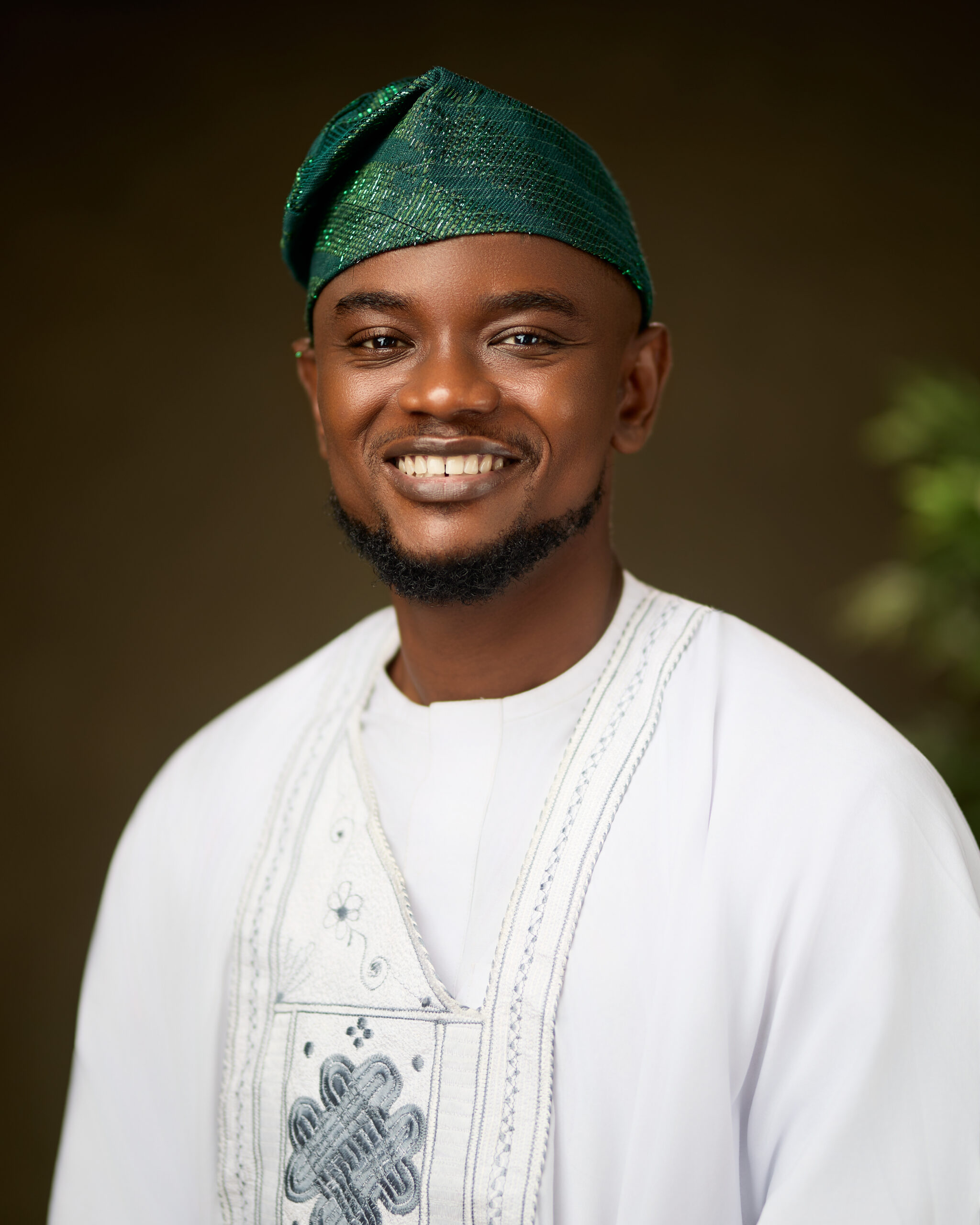 Israel in traditional attire smiling