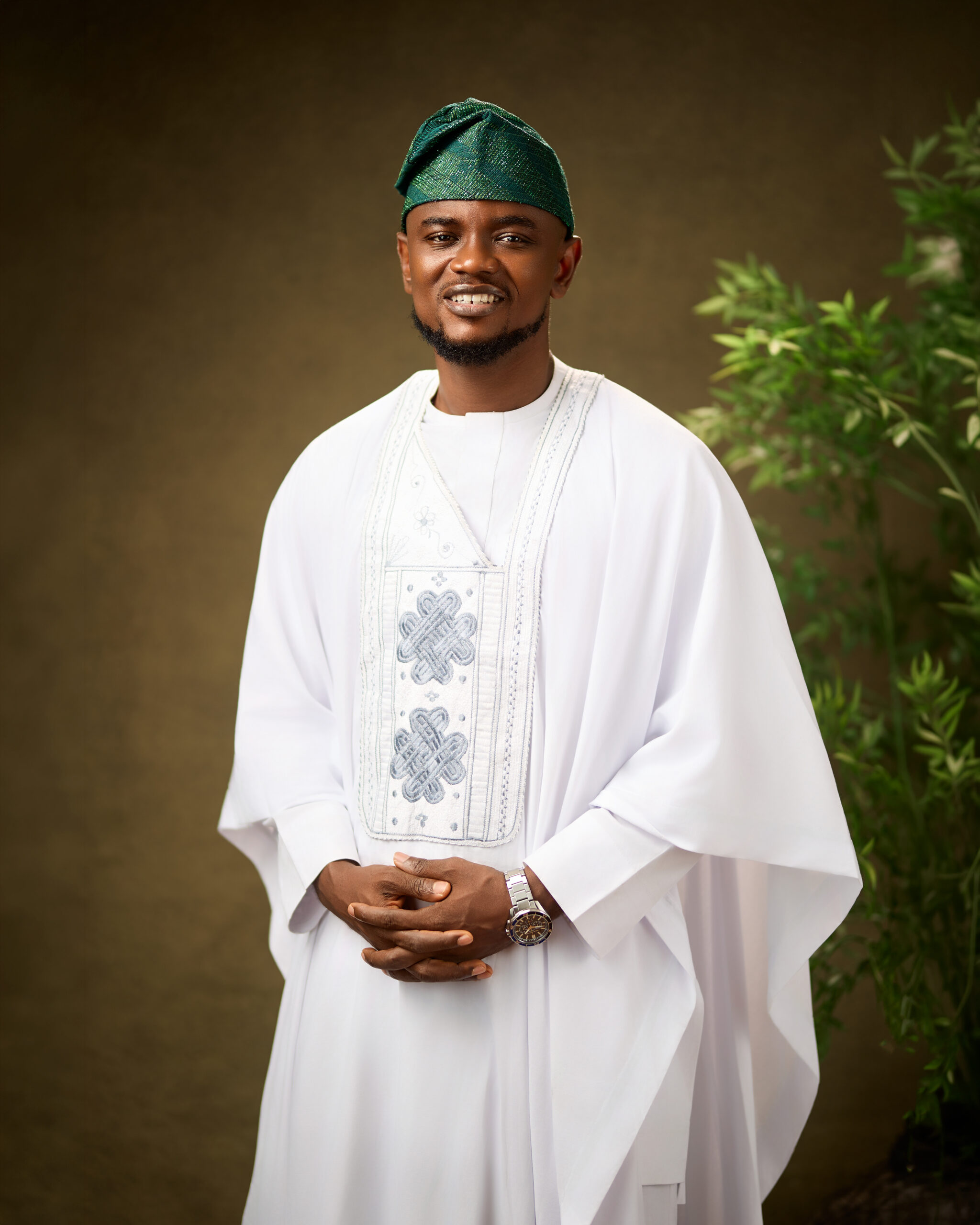 Israel standing in agbada